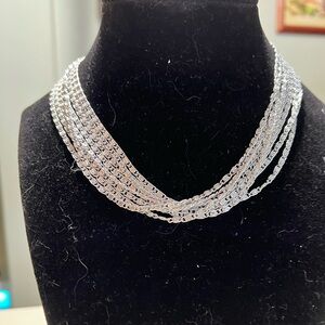 Vintage Sarah Cov silver tone 8 strand choker 15” chain. Cross over closure.